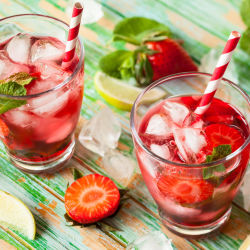 glasses of strawberry and mint infused water on a table