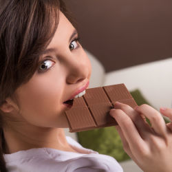 Woman sneaking some chocolate