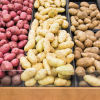 An assortment of different potatoes on sale at the supermarket
