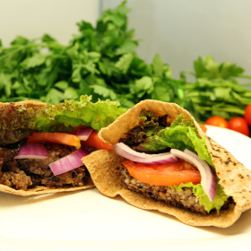 Mushroom bean burger with lettuce tomato and red onion 280x280